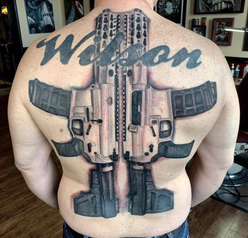 Tattoo uploaded by Domenico Ferraro  Angel with a Ar15 toygun  Tattoodo